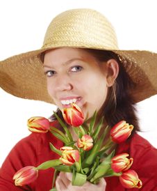 Woman With Tulips And Strawhat Stock Images Woman With Tulips And Strawhat Stock Images