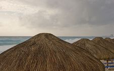 Thatched Roofs And Stormy Sky Royalty Free Stock Photography Thatched Roofs And Stormy Sky Royalty Free Stock Photography