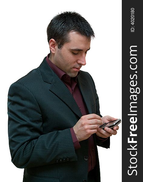 Young businessman typing with a stylus on a touchscreen mobile phone isolated on white background. Young businessman typing with a stylus on a touchscreen mobile phone isolated on white background