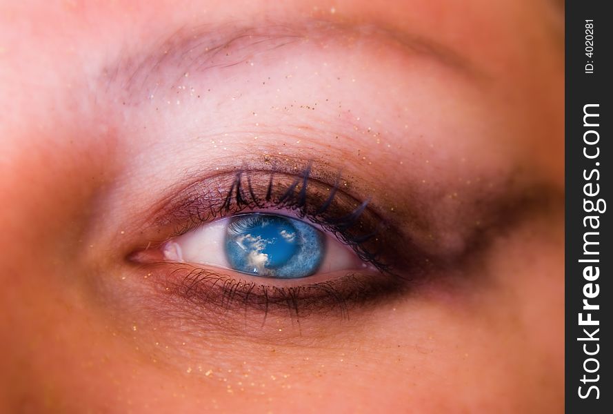 Cloudly sky reflection in the woman eye. Cloudly sky reflection in the woman eye