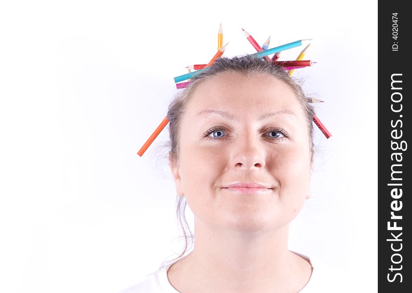 Woman with crayons in hair. Woman with crayons in hair