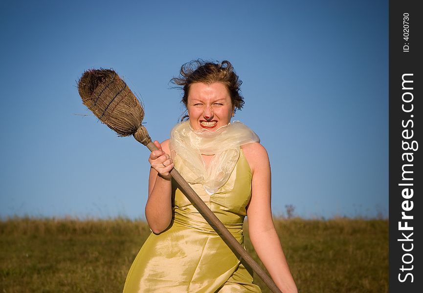 Witch hiting with broom