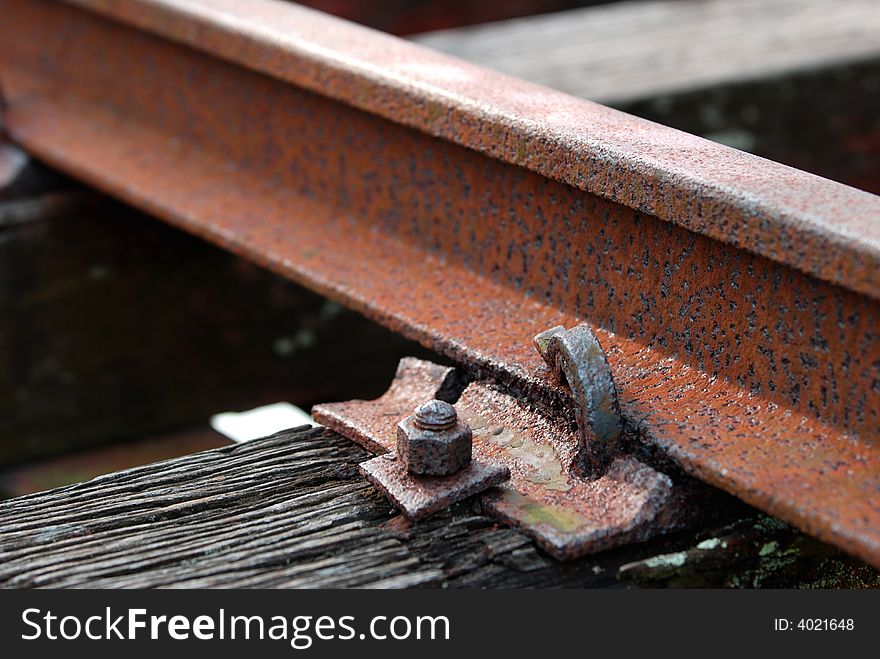 Railways consisting of rusted bots rails and nuts