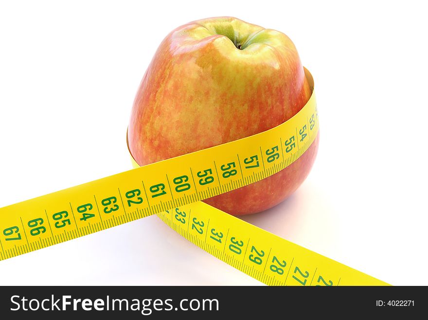Red apple and measuring tape isolated isolated on white background. Red apple and measuring tape isolated isolated on white background