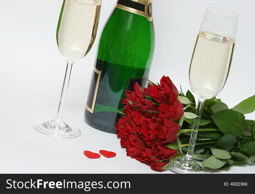 Valentine champagne and two glasses,red rose and two heart´s on white background. Valentine champagne and two glasses,red rose and two heart´s on white background.