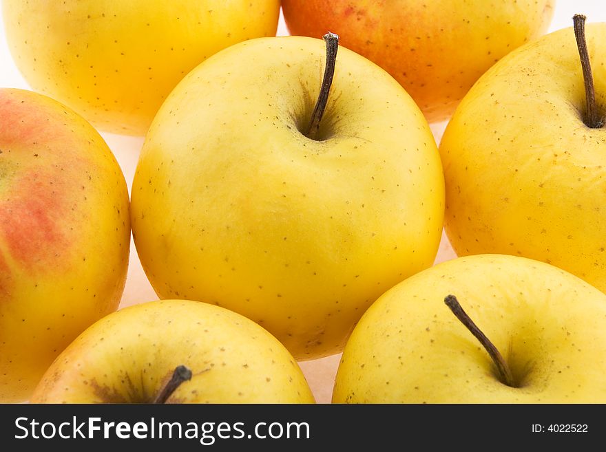 Background from several yellow apples