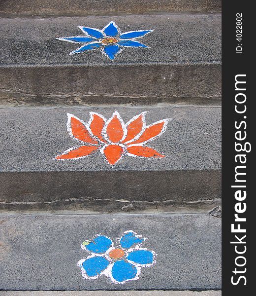 Drawings on the stairs in front of  a home in tamil nadu, india. Drawings on the stairs in front of  a home in tamil nadu, india