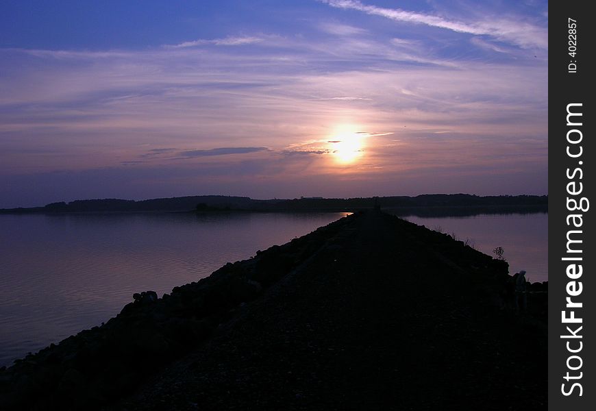 Sunset in summer over reservoir