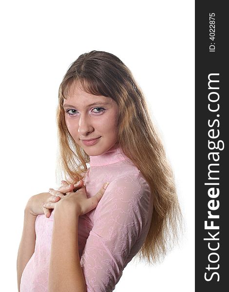 The long-haired girl poses on a white background. The long-haired girl poses on a white background