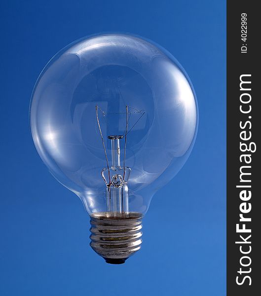 Round Transparent Light Bulb with blue background