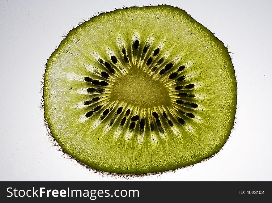 Slice of Kiwi fruit on white background. Slice of Kiwi fruit on white background