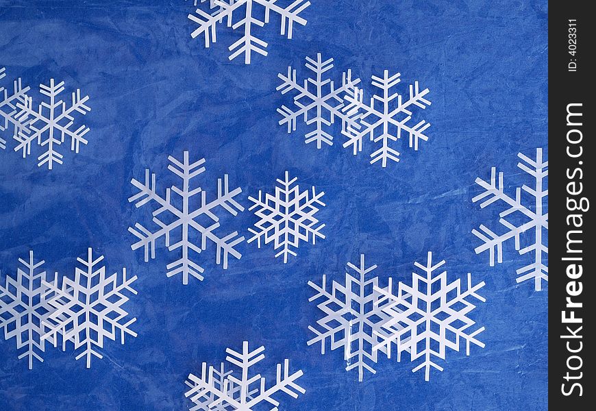 Snowflake pattern on plastic with blue background. Snowflake pattern on plastic with blue background