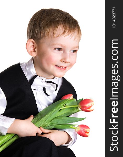 Little boy with a tulips - spring gift