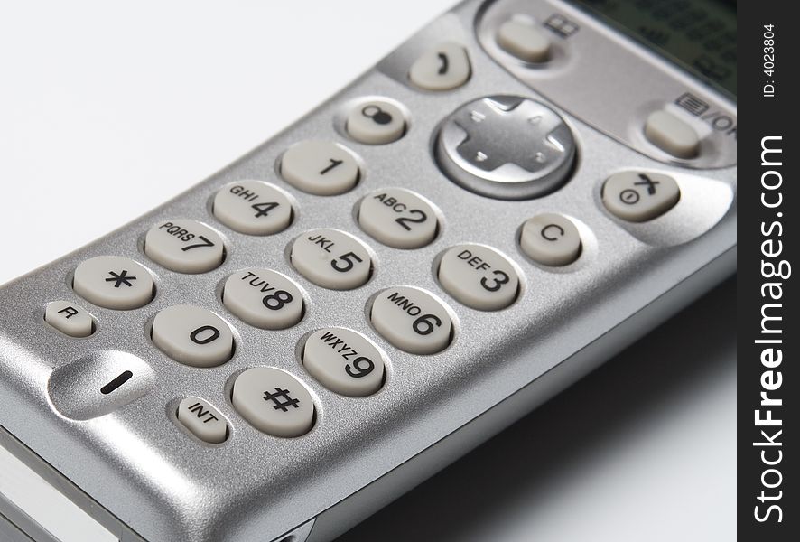 The cordless phone isolated at the white background. The cordless phone isolated at the white background