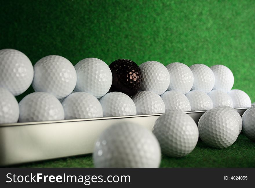 Golfballs with a bad friend amongst them