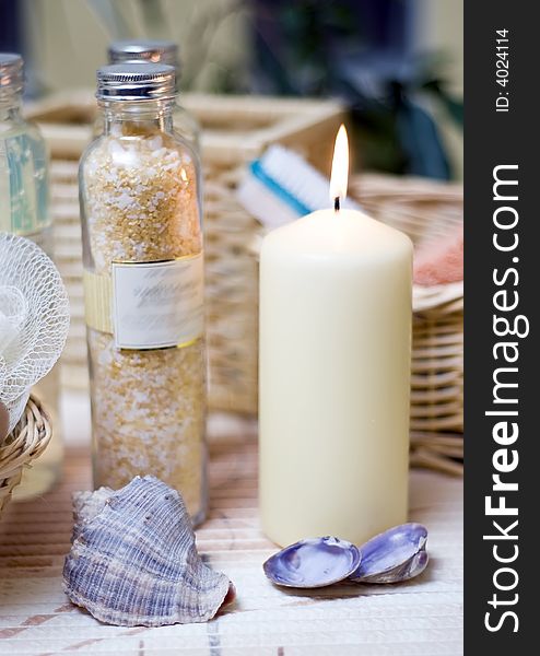 Beige spa composition, a candle, some sea shells, cosmetic bottles. MORE SPA COMPOSITIONS Â». Beige spa composition, a candle, some sea shells, cosmetic bottles. MORE SPA COMPOSITIONS Â»