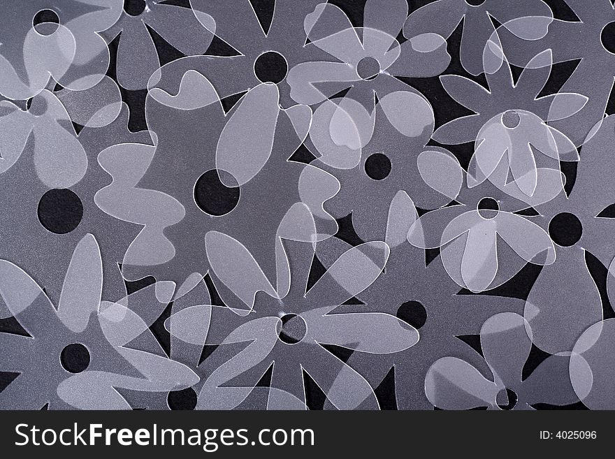 Plastic flowers on a black background. Plastic flowers on a black background