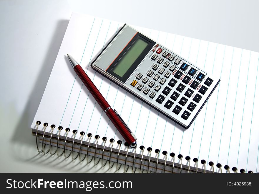 A Scientific Calculator on the desk ready for work. A Scientific Calculator on the desk ready for work