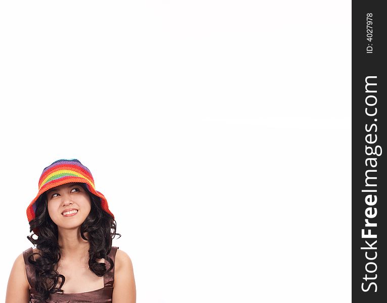 Girl wearing a summer hat - looking up. Girl wearing a summer hat - looking up