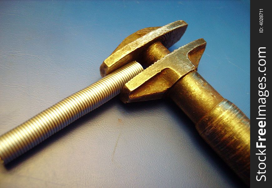 A close detail of an adjustable spanner. A close detail of an adjustable spanner