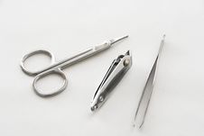 Fork, Clippers And Tweezer Of Depilating. Royalty Free Stock Photos