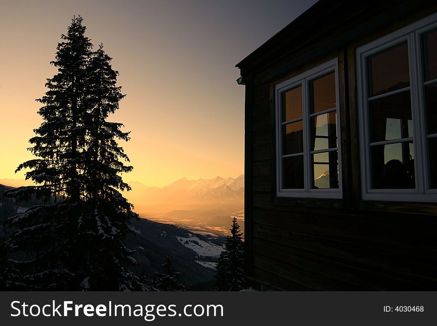 A shot in the alps with a beutiful sky and an alpine restaurant. A shot in the alps with a beutiful sky and an alpine restaurant.