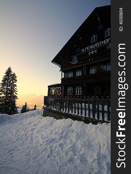 A shot in the alps with a beutiful sky and an alpine restaurant. A shot in the alps with a beutiful sky and an alpine restaurant.