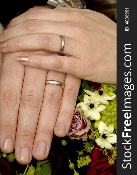 Wedding hands with rings and flowers. Wedding hands with rings and flowers