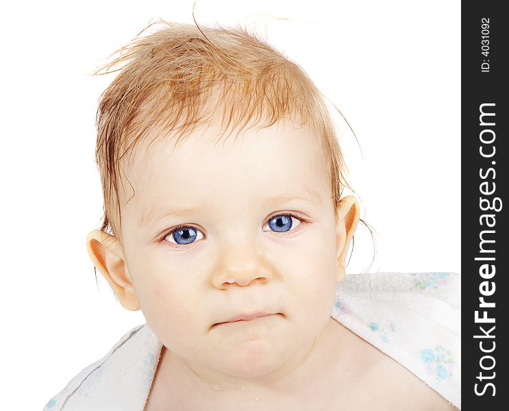 Portrait of the blue-eyed boy after a bath