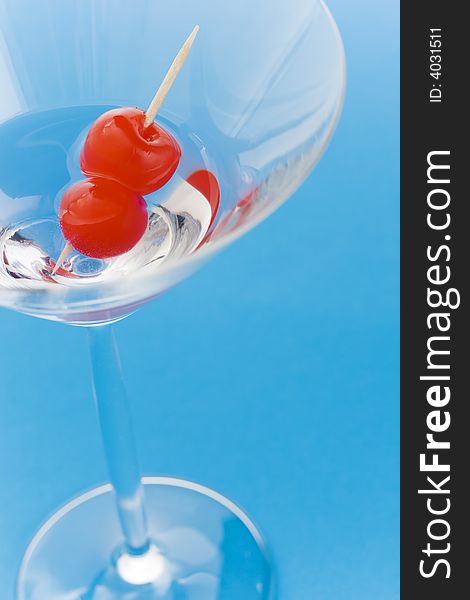 Close up of a cocktail over a blue background