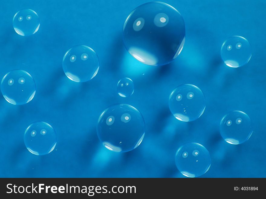 Macro shot of beautiful green water drops