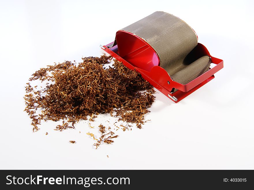 Loose shredded tobacco and cigarette roller for making hand rolled cigarettes