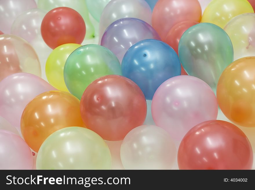 Many coloured balloons as background