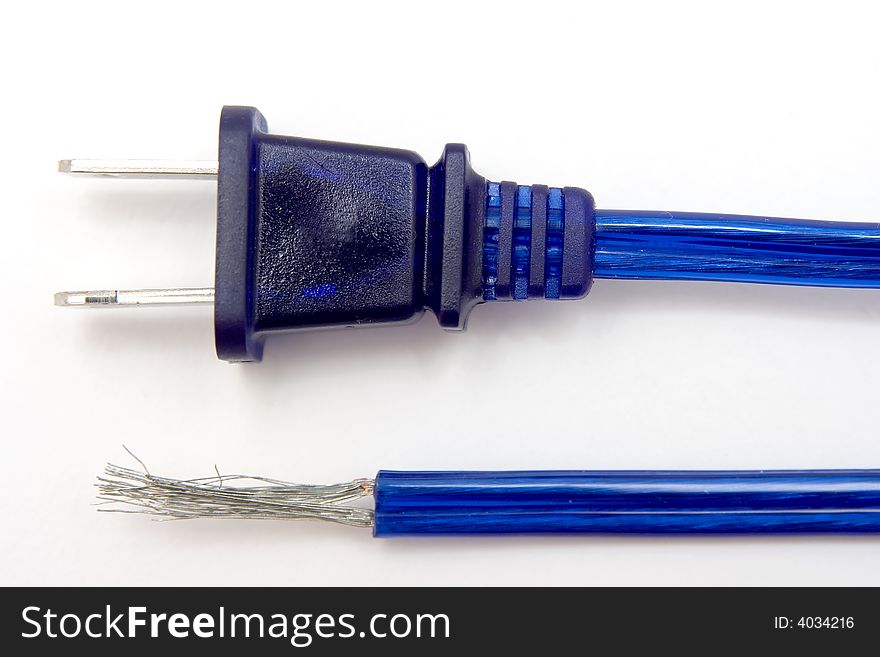 A blue power cord with a cut and frayed end. A blue power cord with a cut and frayed end.