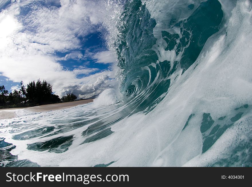 Giant wave breaking on the north shore of oahu. Giant wave breaking on the north shore of oahu