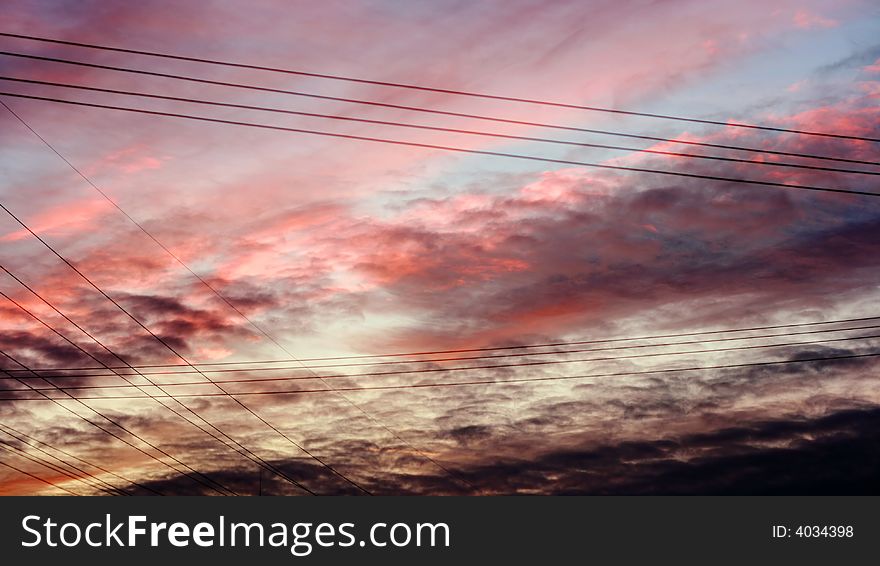 Sky after sunset with crosses of lead wires