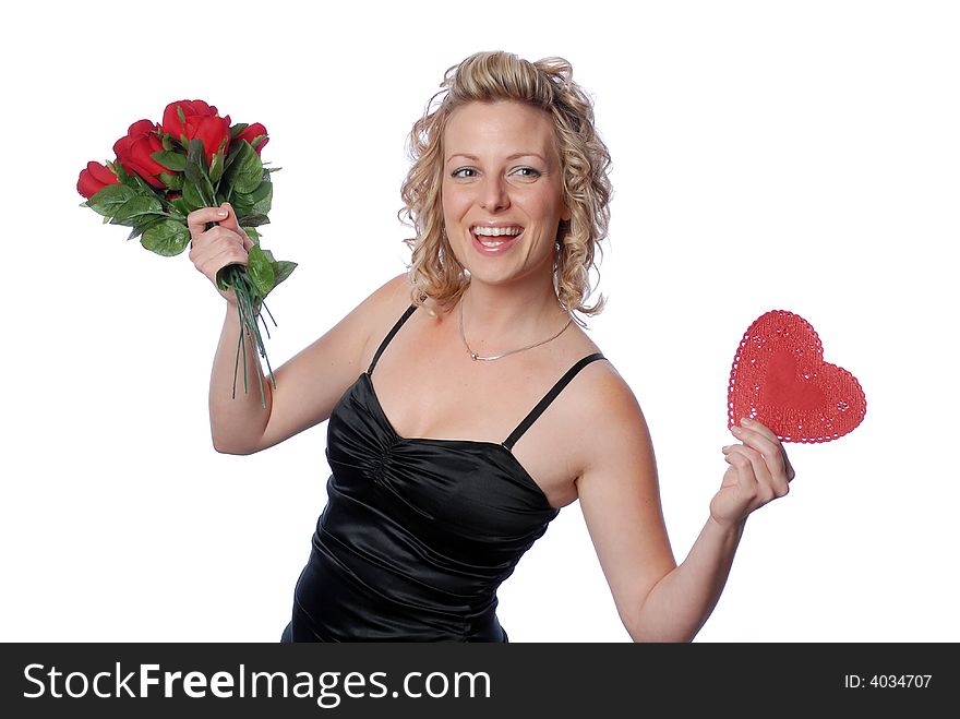 Beautiful woman holding red roses and heart on valentines day. Beautiful woman holding red roses and heart on valentines day