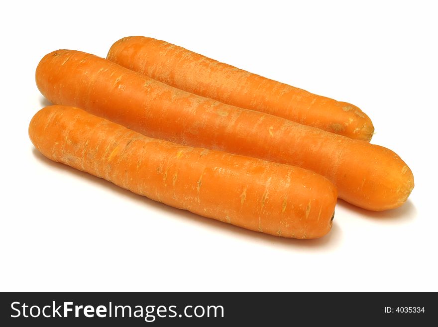 Three Carrots On A White Background