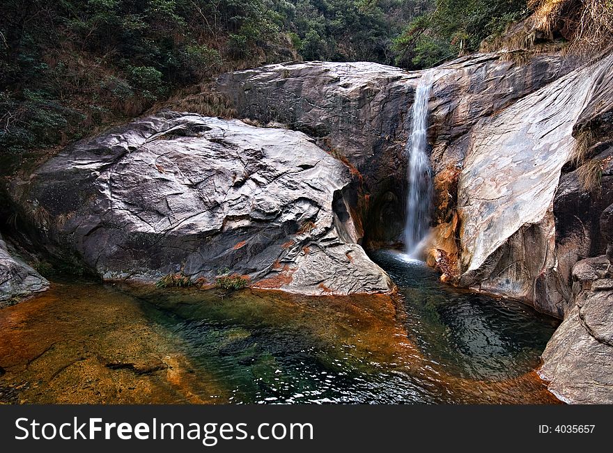 One of the Nine-Dragon waterfalls at Huangshan in China. One of the Nine-Dragon waterfalls at Huangshan in China.