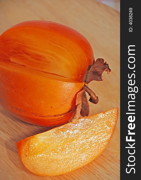 Slice of persimmon close up
