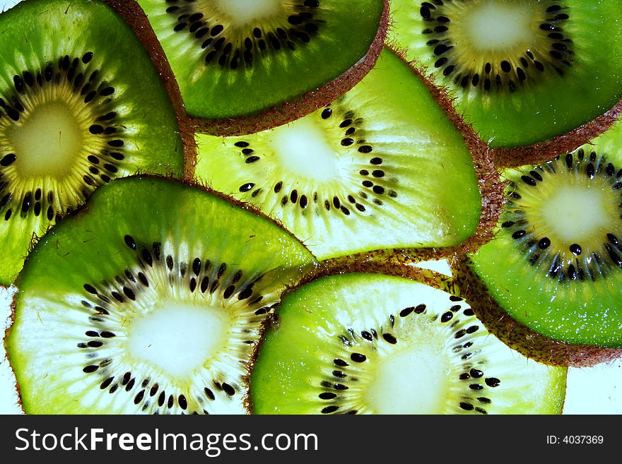 Sliced kiwi fruit on white background. Sliced kiwi fruit on white background