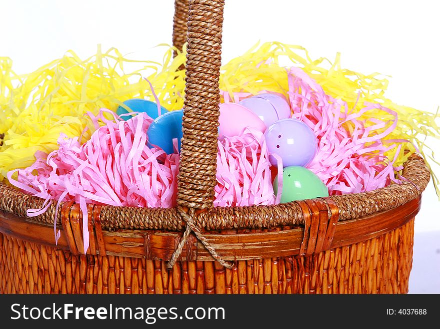 Easter basket filled with eggs and basket filler.