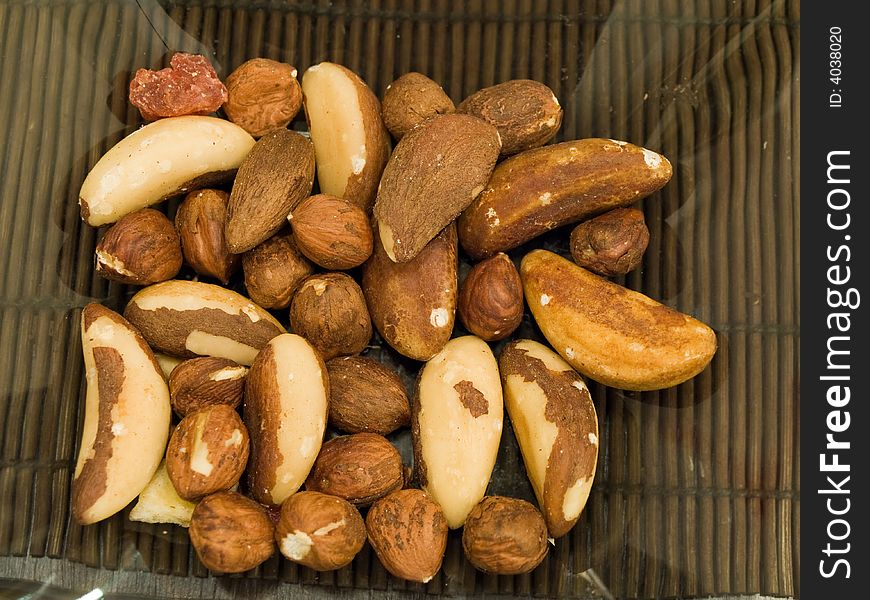 A dish bowl with various nuts