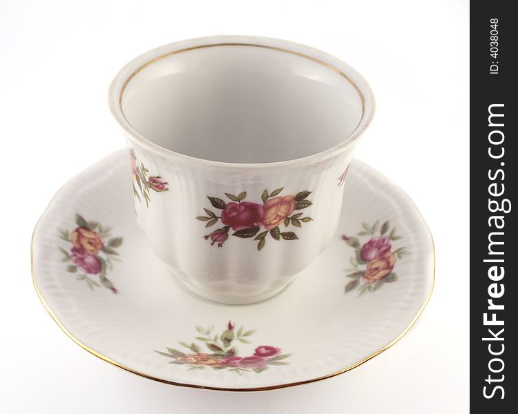 Porcelain cup on white background