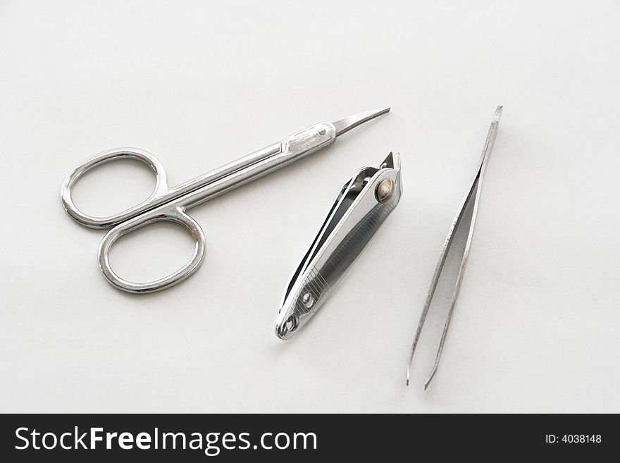 Fork, clippers and tweezer of depilating.