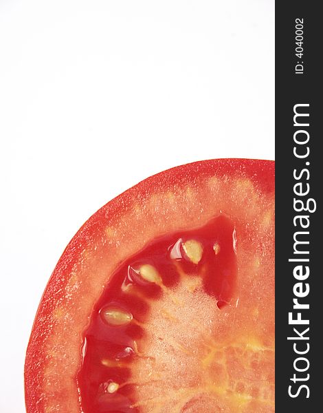 Tomato cross section isolated on white background