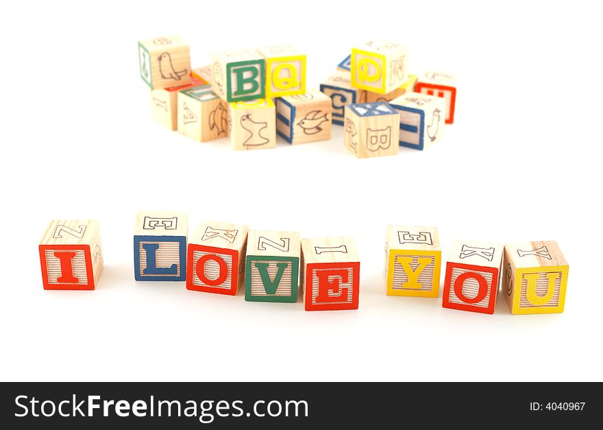 'I LOVE YOU' phrase made using wooden blocks. 'I LOVE YOU' phrase made using wooden blocks