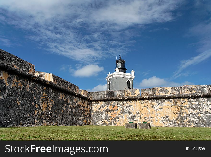 Panorama view of a historical caribbean fortress and lighthouse