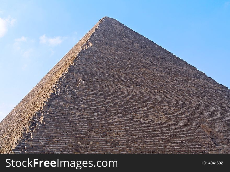 Egyptian pyramid and blue sky