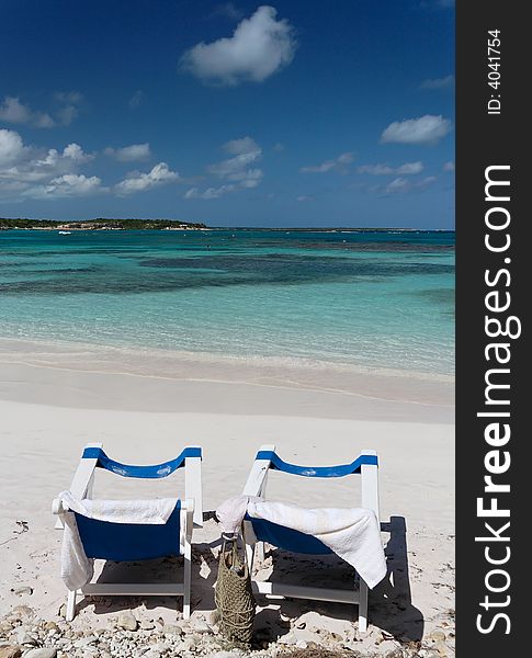 Canvas chairs on a beautiful caribbean beach. Canvas chairs on a beautiful caribbean beach